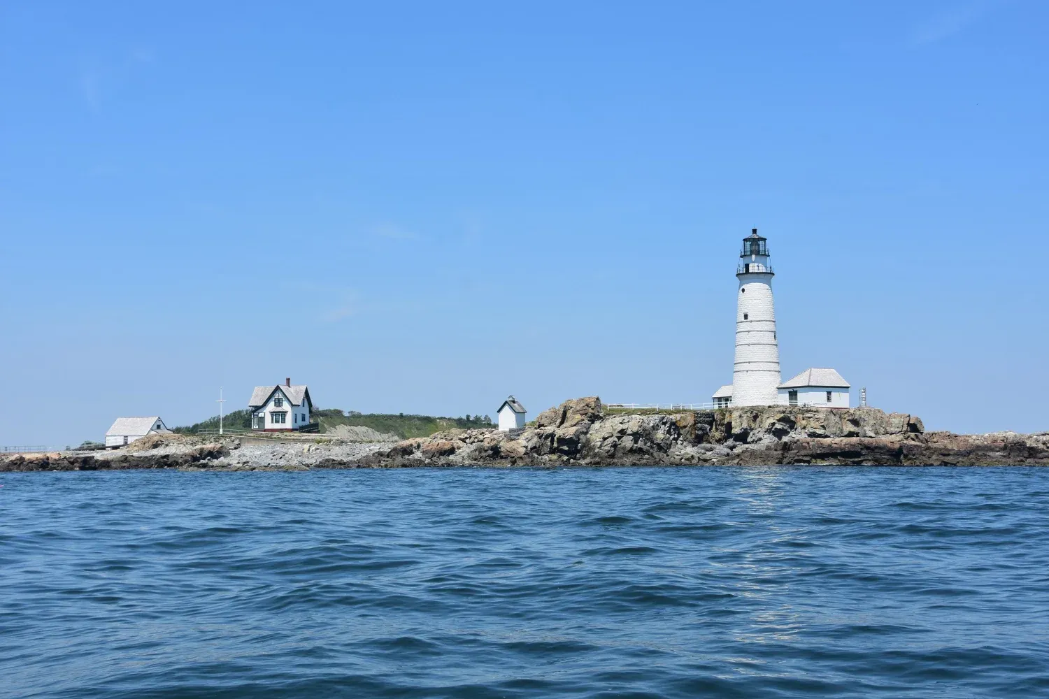 Scenic views of Boston Light in the Boston Harbor Islands on a summer day